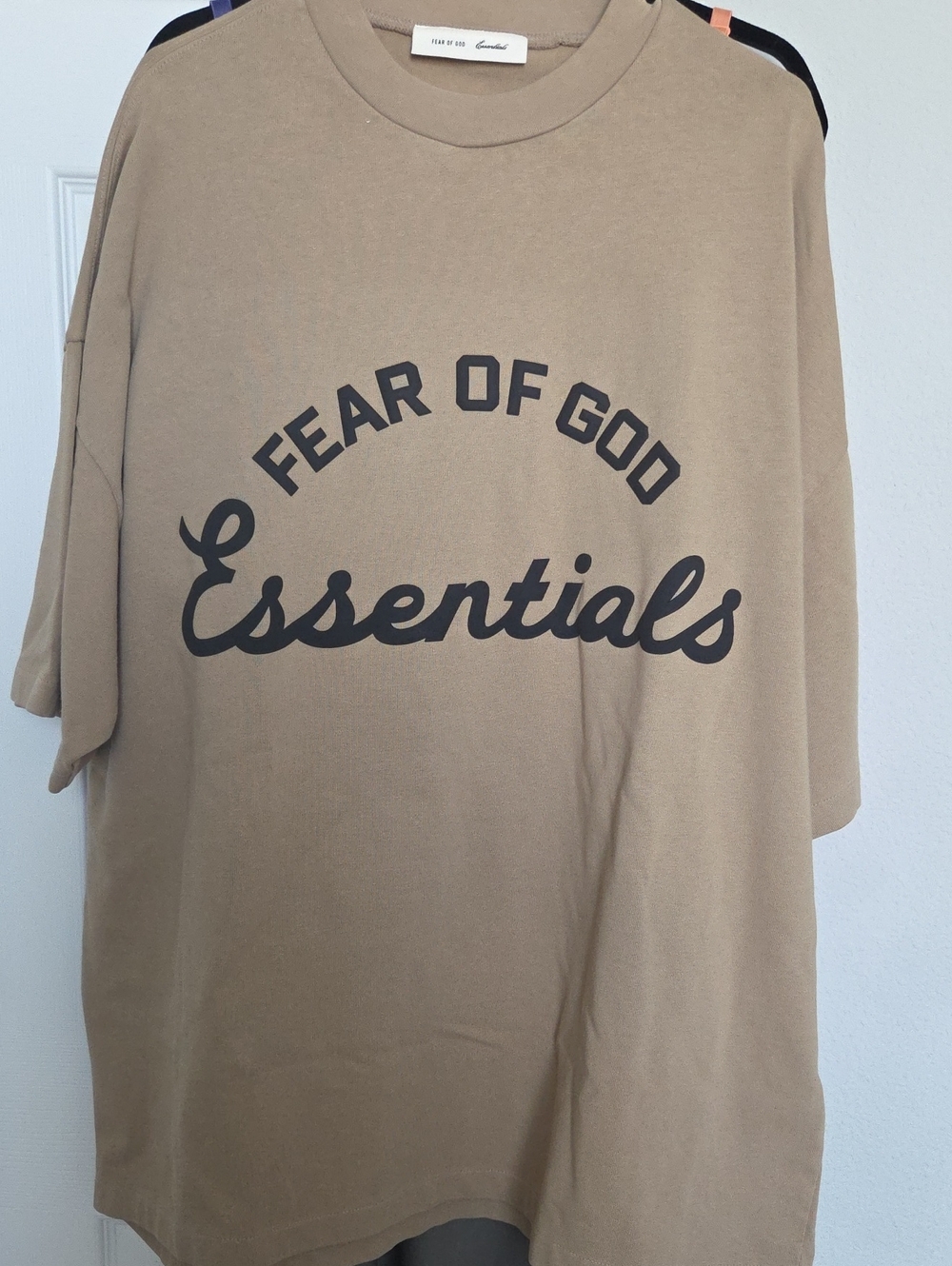 Fear of God Essentials Tan Tee with Black Logo